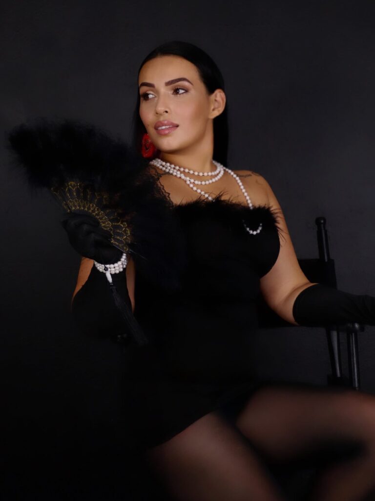 Personal branding portrait of a woman in an elegant black outfit